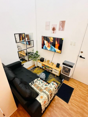 2 Bedroom and Bathroom Staycation Condo in Mandaluyong City near BONI MRT with WIFI and KARAOKE and POOL